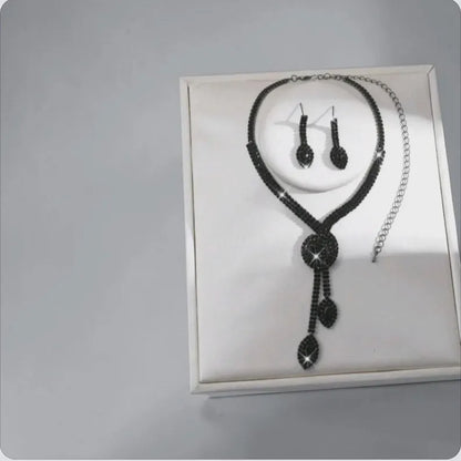 Black jewelry set: chic and elegant necklace and earrings